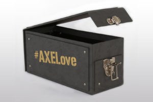 Black turned edge box with #AXELove on the side in gold lettering and the lid open with a silver clasp