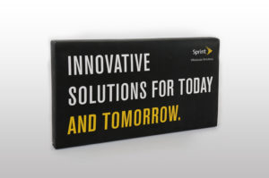 Black product introduction box for Sprint with white and yellow writing that says innovative solutions for today and tomorrow