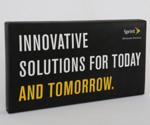 Black product introduction box for Sprint with white and yellow writing that says innovative solutions for today and tomorrow