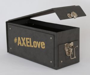 Black turned edge box with #AXELove on the side in gold lettering and the lid open with a silver clasp