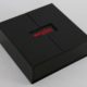 Black display sample box customized with red logo on the front