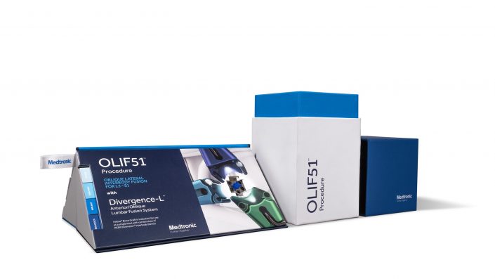 Promotional portfolio kit for Medtronic with blue and white box, a wide triangle shaped informational box and a dark blue smaller box all lined up