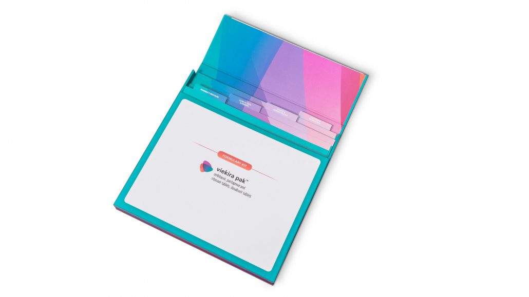 Teal turned edge informational folder with multi color tabs under the top flap