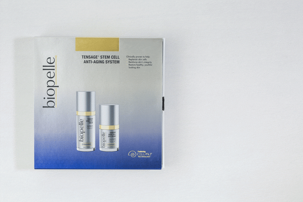 Unboxing of custom sliding packaging sleeve for an anti-aging product with light grey and blue cover and protective sleeve
