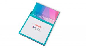 Teal informational turned edge folder with multi color tabs under the top flap and a magnetic flap on the front