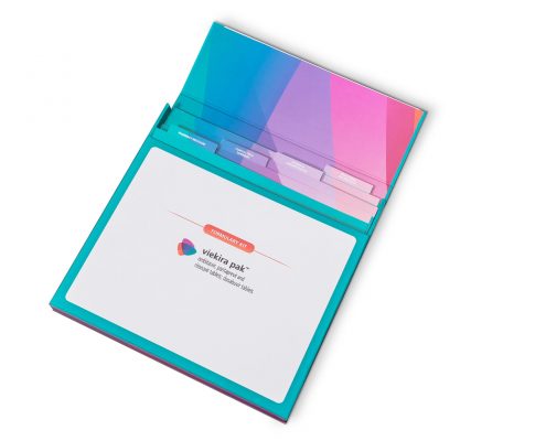 Teal informational turned edge folder with multi color tabs under the top flap and a magnetic flap on the front