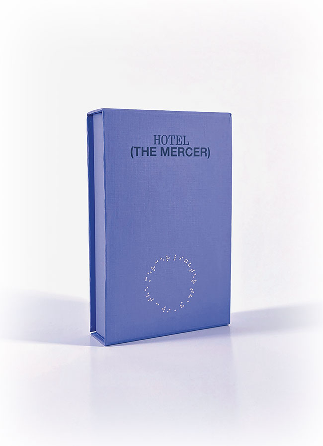 purple branded packaging with gold foil stamp